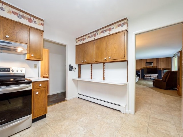 3 Brookland Farms Rd, Poughkeepsie, NY 12601 - kitchen featuring stainless steel range with electric stovetop, baseboard heating, under cabinet range hood, brown cabinets, and light countertops