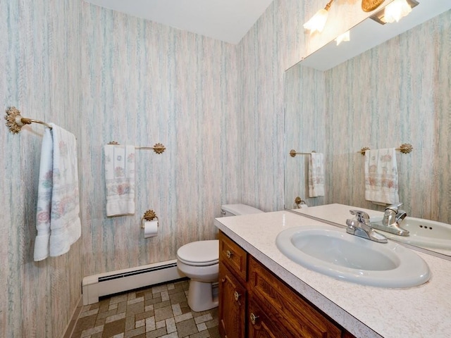 3 Brookland Farms Rd, Poughkeepsie, NY 12601 - bathroom featuring baseboard heating, wallpapered walls, vanity, toilet, and tile patterned floors