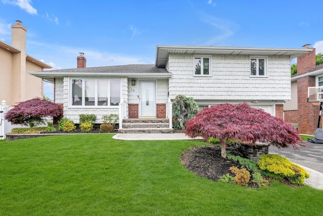 19 Alan Ct, Plainview, NY 11803 - split level home featuring a front lawn and a chimney