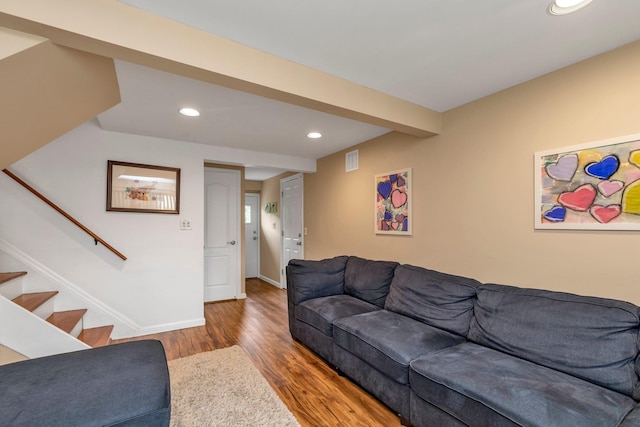 19 Alan Ct, Plainview, NY 11803 - living area with wood finished floors, recessed lighting, stairway, and baseboards