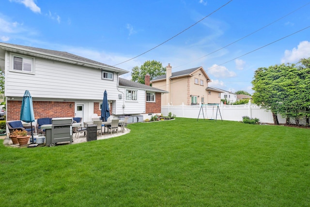 19 Alan Ct, Plainview, NY 11803 - rear view of house featuring brick siding and a patio