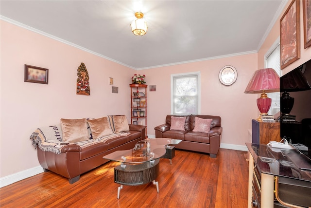 597 Stratford Rd, Baldwin, NY 11510 - living room with crown molding, wood finished floors, and baseboards