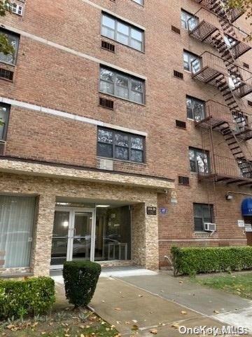 153-25 88th St Unit 4B, Howard Beach, NY 11414 - view of apartment building / complex with cooling unit