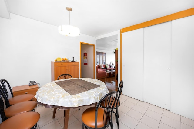 215 Park Row Unit 8B, New York Manhattan, NY 10038 - dining space with light tile patterned floors