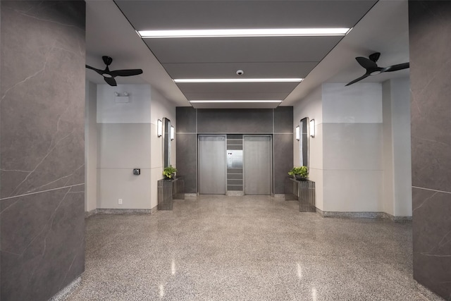 215 Park Row Unit 8B, New York Manhattan, NY 10038 - hallway with speckle patterned floor and elevator