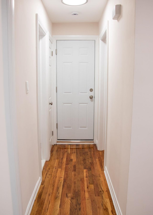 11 Shine Pl, Valley Stream, NY 11581 - corridor featuring wood finished floors and baseboards