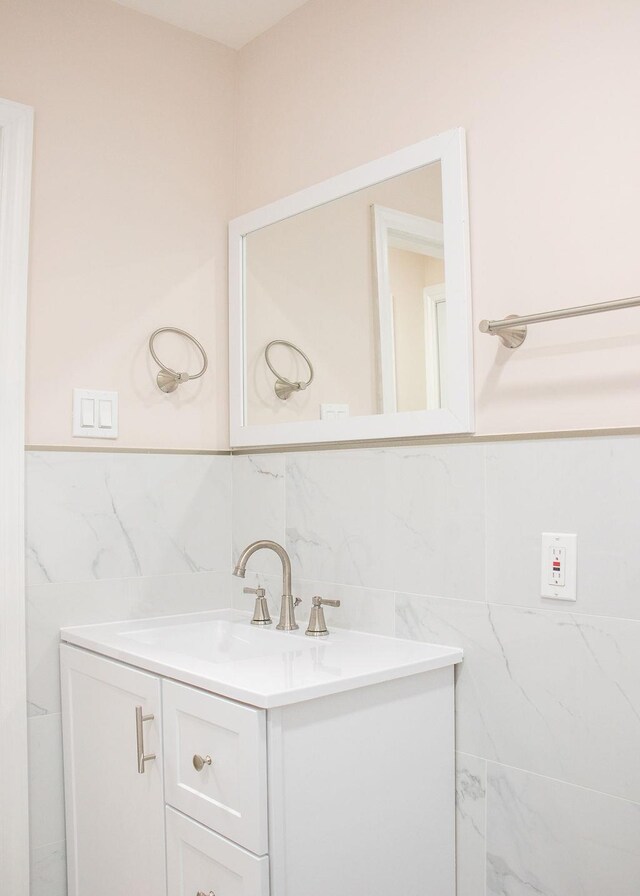 11 Shine Pl, Valley Stream, NY 11581 - bathroom with vanity and tile walls