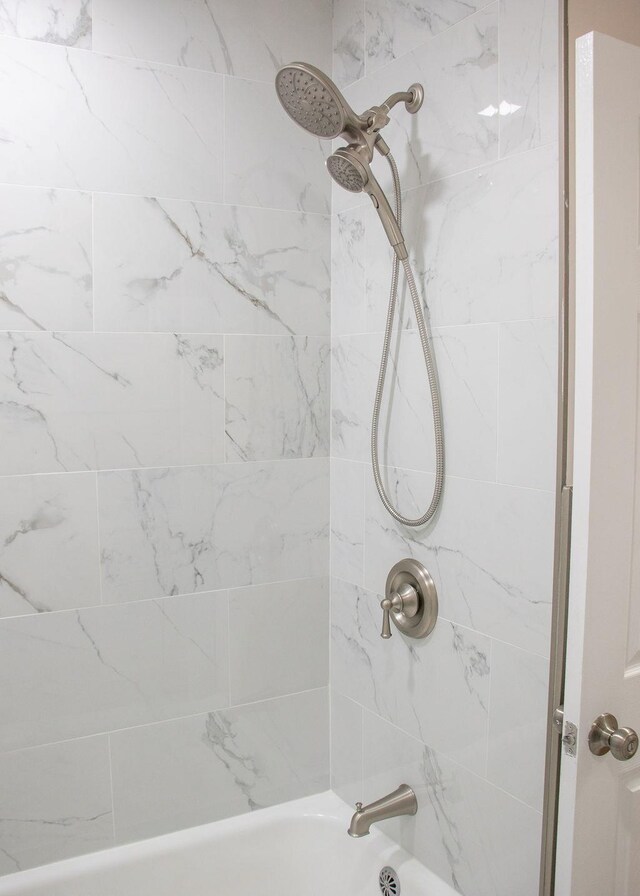 11 Shine Pl, Valley Stream, NY 11581 - bathroom featuring shower / bathtub combination