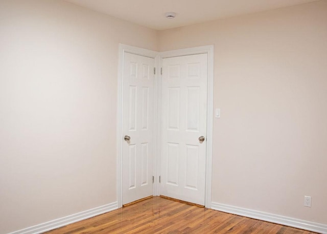 11 Shine Pl, Valley Stream, NY 11581 - unfurnished bedroom with light wood-style flooring and baseboards