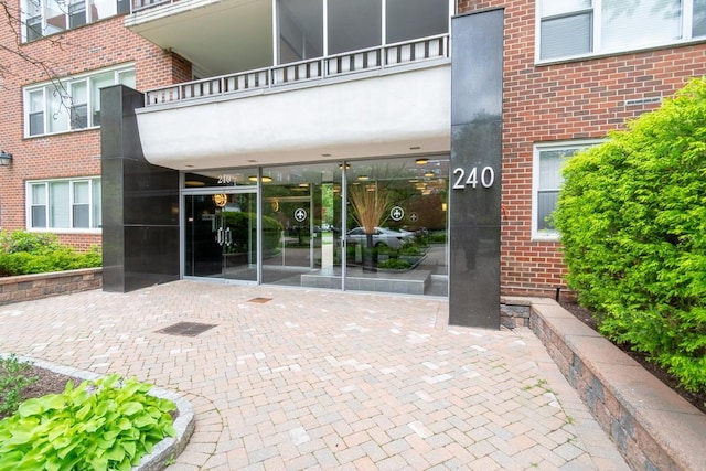 240 Garth Rd Unit 2G2, Scarsdale, NY 10583 - property entrance with brick siding