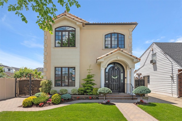 158-44 87th St, Howard Beach, NY 11414 - mediterranean / spanish home with stucco siding and a tile roof