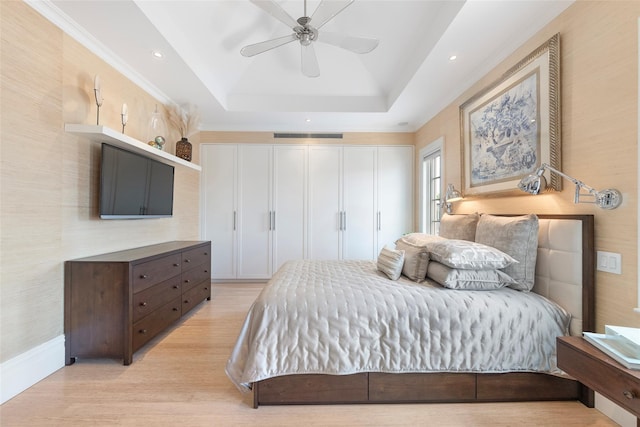 158-44 87th St, Howard Beach, NY 11414 - bedroom with light wood finished floors, a raised ceiling, recessed lighting, and a ceiling fan