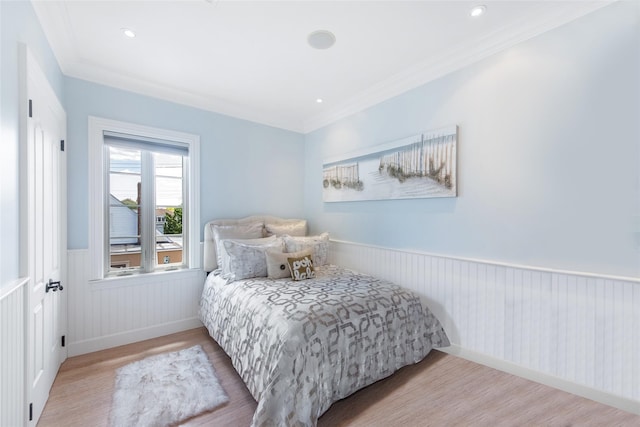 158-44 87th St, Howard Beach, NY 11414 - bedroom featuring wood finished floors, wainscoting, crown molding, and baseboards