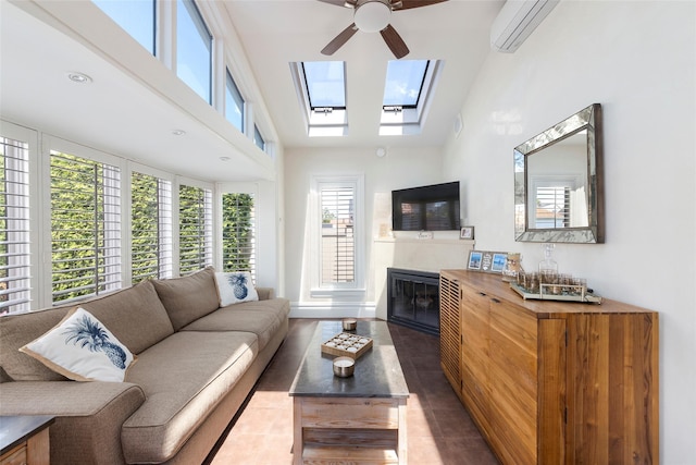 158-44 87th St, Howard Beach, NY 11414 - living area with an AC wall unit, ceiling fan, a skylight, a glass covered fireplace, and dark tile patterned flooring