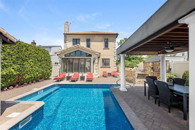 158-44 87th St, Howard Beach, NY 11414 - view of swimming pool featuring a patio, ceiling fan, an outdoor hangout area, and an outdoor kitchen