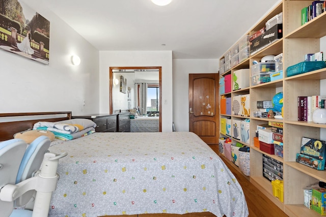 99-31 66th Ave Unit 5A, Rego Park, NY 11374 - bedroom featuring wood finished floors