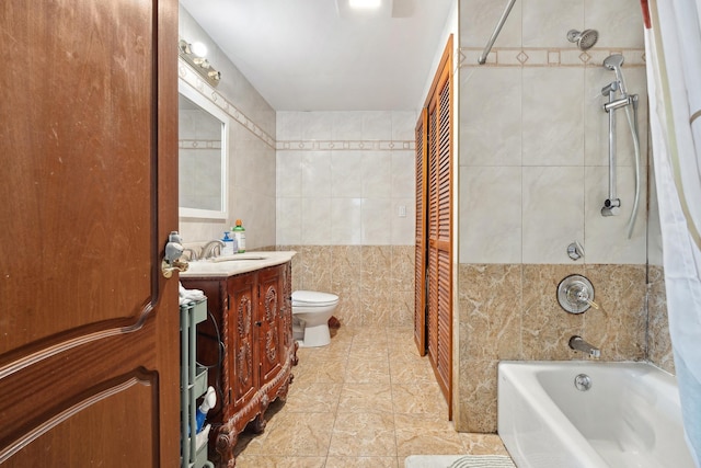99-31 66th Ave Unit 5A, Rego Park, NY 11374 - bathroom featuring tile walls, vanity, toilet, and shower / bath combination