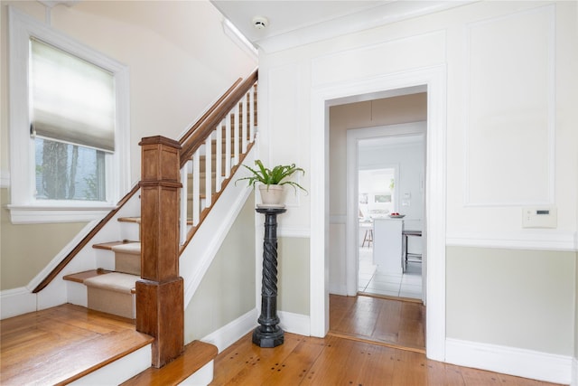 43 W 4th St, Locust Valley, NY 11560 - staircase featuring hardwood / wood-style floors and baseboards