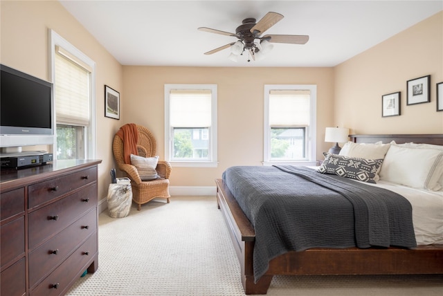43 W 4th St, Locust Valley, NY 11560 - bedroom featuring light carpet, baseboards, and a ceiling fan