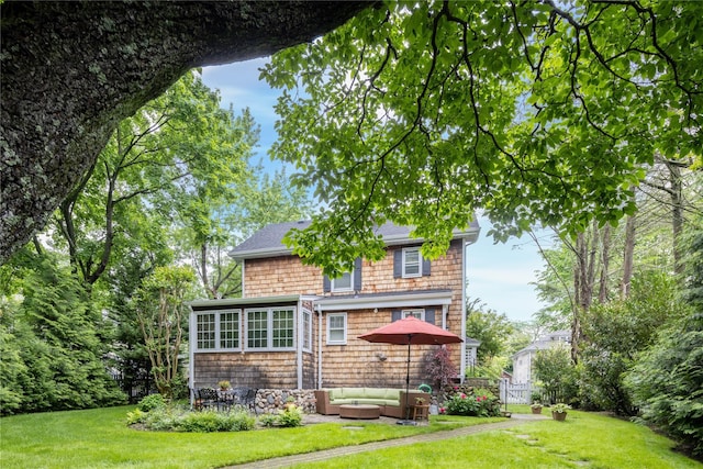 43 W 4th St, Locust Valley, NY 11560 - rear view of property with an outdoor hangout area, a shingled roof, and a patio area