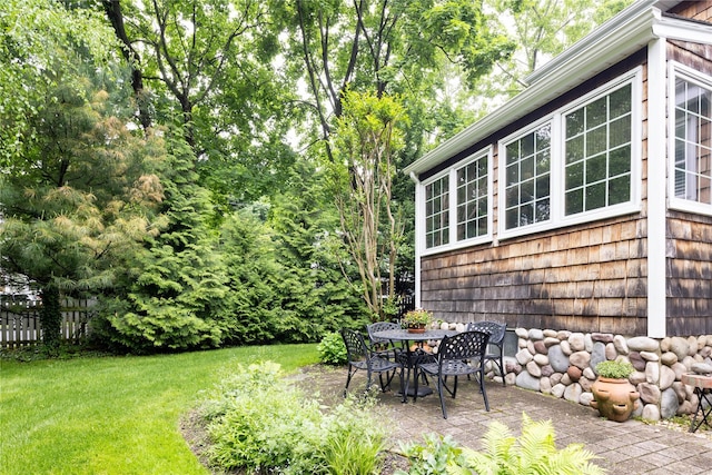 43 W 4th St, Locust Valley, NY 11560 - view of grassy yard featuring a patio area and outdoor dining space