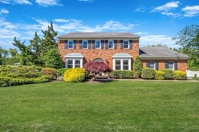 20 Vineyard Way, Mount Sinai, NY 11766 - view of front facade featuring a front lawn and brick siding