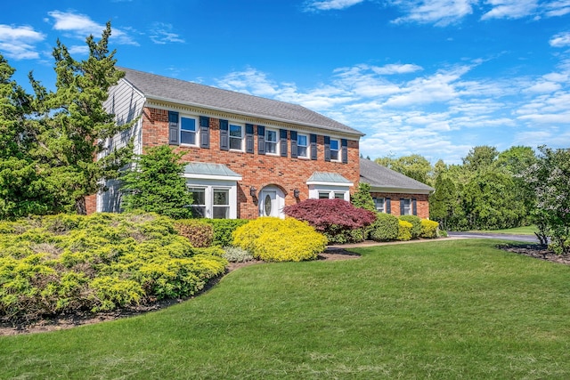 20 Vineyard Way, Mount Sinai, NY 11766 - colonial home with brick siding and a front yard