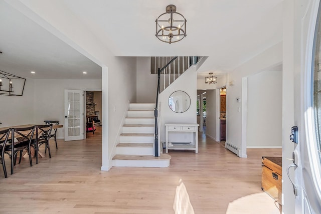 20 Vineyard Way, Mount Sinai, NY 11766 - entryway featuring a baseboard radiator, a chandelier, stairs, light wood-style floors, and recessed lighting