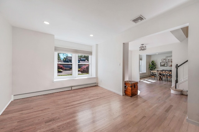 20 Vineyard Way, Mount Sinai, NY 11766 - unfurnished room with a baseboard heating unit, light wood-style flooring, baseboards, and recessed lighting