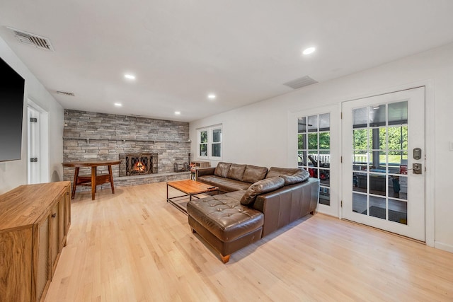20 Vineyard Way, Mount Sinai, NY 11766 - living room with light wood-style floors, recessed lighting, and a stone fireplace