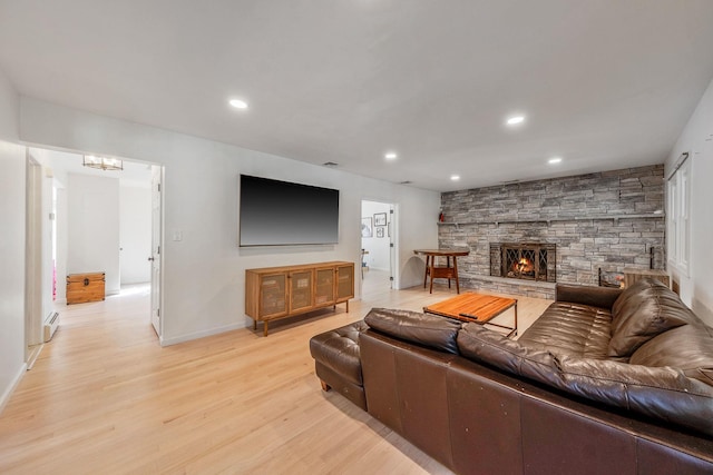 20 Vineyard Way, Mount Sinai, NY 11766 - living room featuring light wood finished floors, a chandelier, recessed lighting, baseboards, and a fireplace