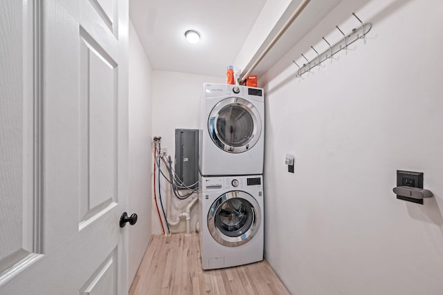 20 Vineyard Way, Mount Sinai, NY 11766 - washroom with stacked washer and clothes dryer and light wood-style floors