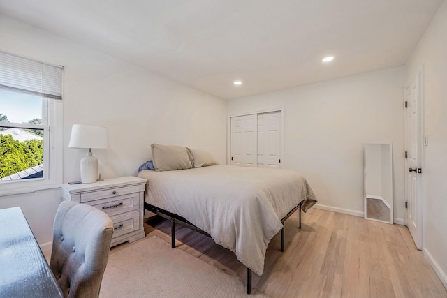 20 Vineyard Way, Mount Sinai, NY 11766 - bedroom with light wood finished floors, a closet, baseboards, and recessed lighting