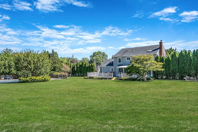 20 Vineyard Way, Mount Sinai, NY 11766 - view of green lawn with a deck