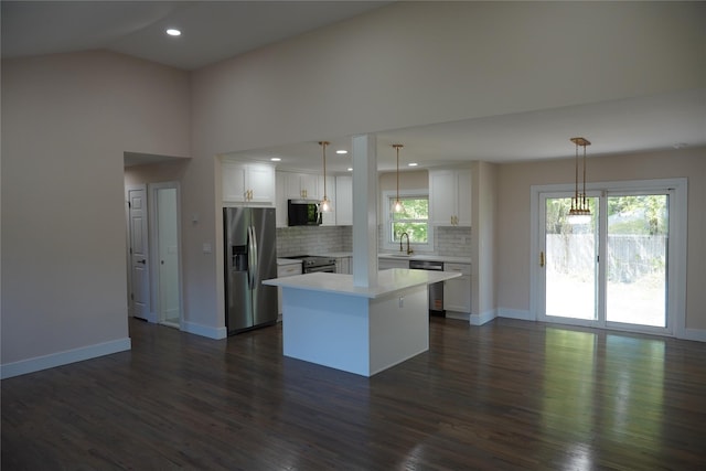 352 Bay Ave, Patchogue, NY 11772 - kitchen featuring appliances with stainless steel finishes, a sink, light countertops, white cabinets, and recessed lighting