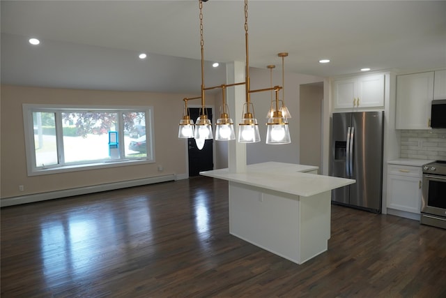 352 Bay Ave, Patchogue, NY 11772 - kitchen with appliances with stainless steel finishes, a baseboard radiator, white cabinets, a chandelier, and backsplash