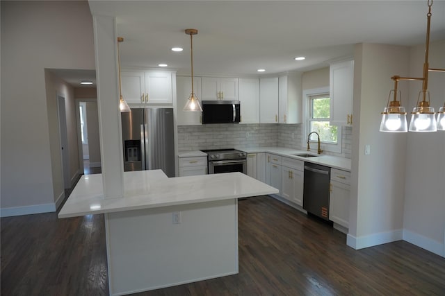 352 Bay Ave, Patchogue, NY 11772 - kitchen with appliances with stainless steel finishes, a sink, baseboards, backsplash, and white cabinetry