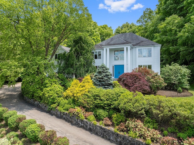 43 Random Farms Cir, Chappaqua, NY 10514 - greek revival house with a shingled roof