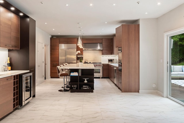 43 Random Farms Cir, Chappaqua, NY 10514 - kitchen with premium appliances, beverage cooler, wall chimney exhaust hood, light marble finish flooring, and tasteful backsplash