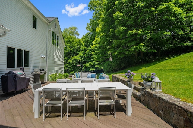 43 Random Farms Cir, Chappaqua, NY 10514 - wooden deck with area for grilling, outdoor dining area, and a lawn