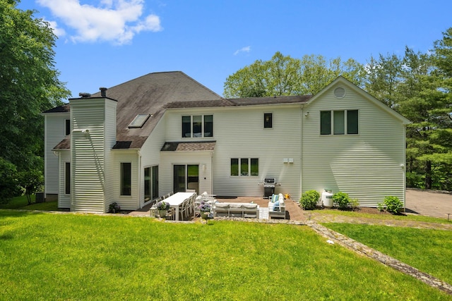 43 Random Farms Cir, Chappaqua, NY 10514 - rear view of house featuring a patio, an outdoor living space, a yard, and a chimney