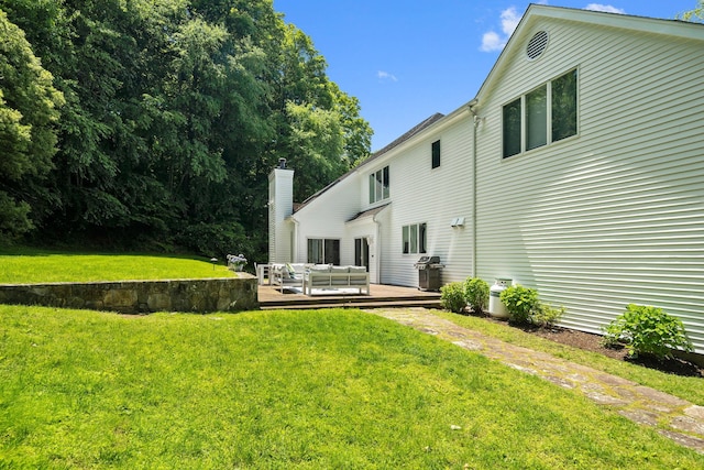 43 Random Farms Cir, Chappaqua, NY 10514 - rear view of property featuring an outdoor hangout area, a lawn, a wooden deck, and a chimney