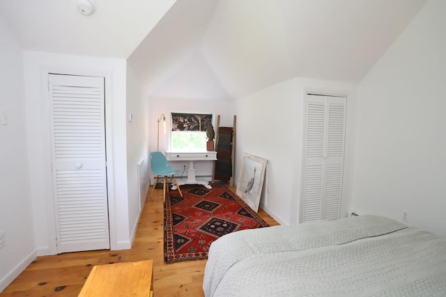 605 Dutch Hill Rd, Call Listing Agent, NY 12776 - bedroom featuring wood finished floors, vaulted ceiling, and baseboards