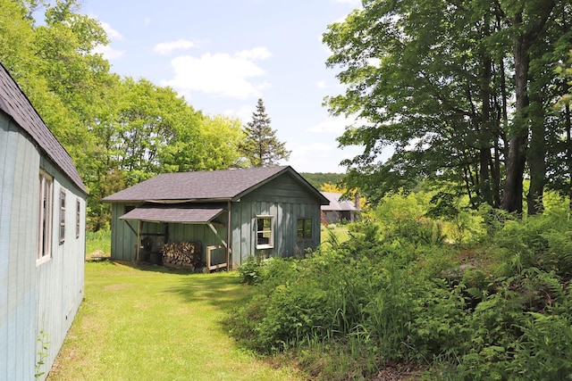 605 Dutch Hill Rd, Call Listing Agent, NY 12776 - view of green lawn featuring an outdoor structure