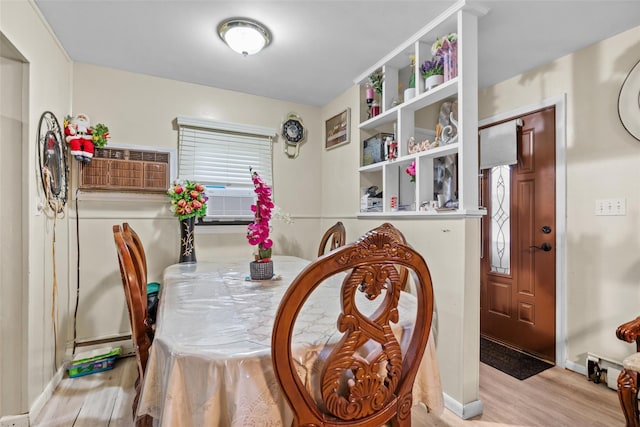 37 Prospect St, Garnerville, NY 10923 - dining space featuring wood finished floors, cooling unit, and an AC wall unit
