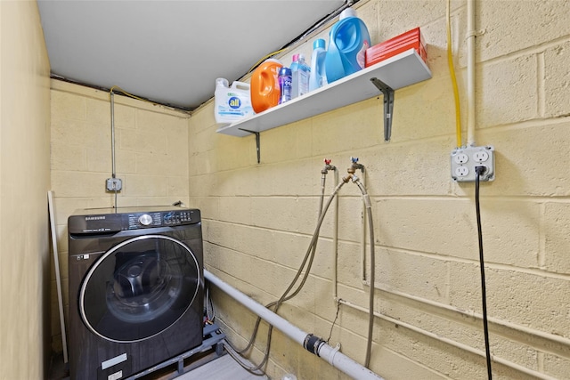 37 Prospect St, Garnerville, NY 10923 - laundry room featuring washer / dryer and concrete block wall