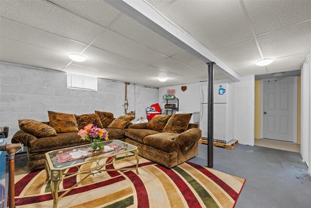 37 Prospect St, Garnerville, NY 10923 - living room featuring concrete flooring and a drop ceiling