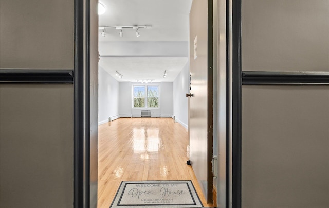 42-30 Douglaston Pkwy Unit 7H, Douglaston, NY 11363 - hall with wood finished floors and baseboards