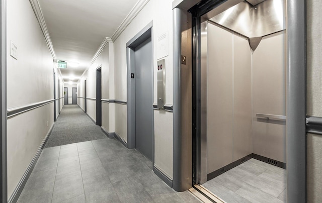 42-30 Douglaston Pkwy Unit 7H, Douglaston, NY 11363 - corridor featuring elevator and crown molding