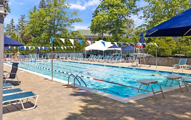 42-30 Douglaston Pkwy Unit 7H, Douglaston, NY 11363 - community pool featuring a patio